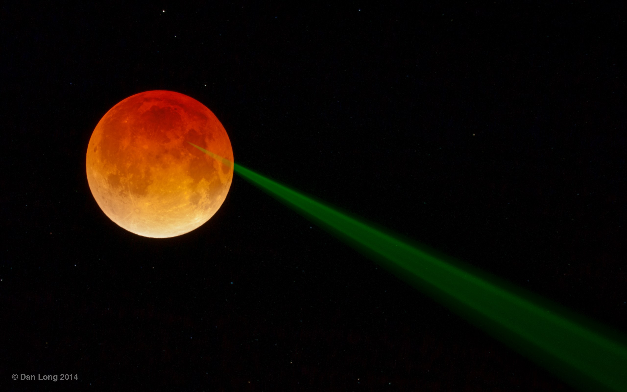 Eclipsed moon under fire
